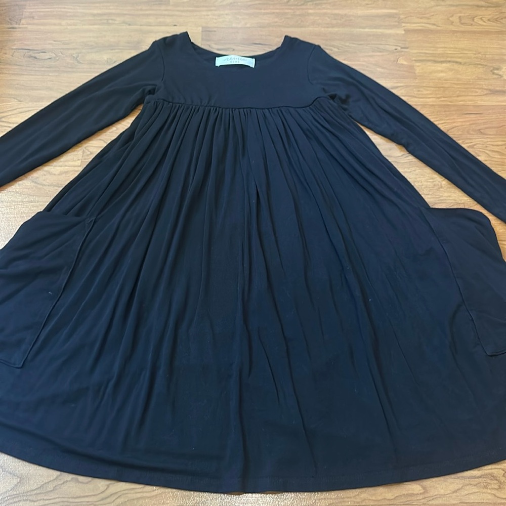 Remie Girl twirl pocket dress in size 7.